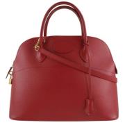 Pre-owned Leather handbags Hermès Vintage , Red , Dames