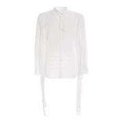 Upgrade je formele garderobe met dit witte katoenen overhemd Comme des...