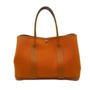 Pre-owned Canvas handbags Hermès Vintage , Orange , Dames