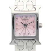Tweedehands Hermès horloge in roze metaal Hermès Vintage , Pink , Unis...
