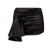 Zwarte Satijnen Minirok met Knoopdetail Dolce & Gabbana , Black , Dame...