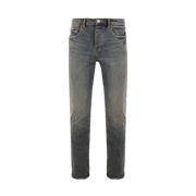 Slim-Fit Denim Jeans in Indigo met Distressed Effect Purple Brand , Bl...