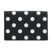 Zwarte leren portemonnee met polkadotprint Comme des Garçons , Black ,...