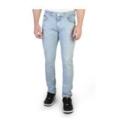Slim Fit Jeans in effen kleur met knoop- en ritssluiting Tommy Hilfige...