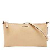 Pre-owned Leather clutches Coach Pre-owned , Beige , Dames