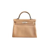 Pre-owned Leather handbags Hermès Vintage , Beige , Dames