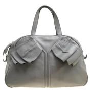 Pre-owned Leather handbags Yves Saint Laurent Vintage , Gray , Dames