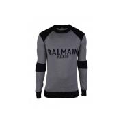 Grijze wollen trui met zwart logo Balmain , Gray , Heren