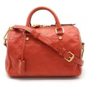 Pre-owned Canvas handbags Louis Vuitton Vintage , Red , Dames