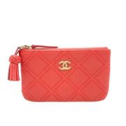 Pre-owned Leather clutches Chanel Vintage , Orange , Dames