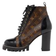 Pre-owned Canvas boots Louis Vuitton Vintage , Brown , Dames