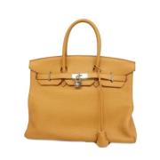 Pre-owned Leather handbags Hermès Vintage , Yellow , Dames