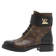 Pre-owned Coated canvas boots Louis Vuitton Vintage , Brown , Dames