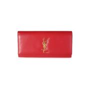 Pre-owned Leather clutches Yves Saint Laurent Vintage , Red , Dames