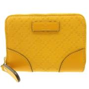 Pre-owned Canvas wallets Gucci Vintage , Yellow , Dames