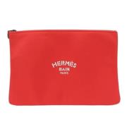 Pre-owned Fabric clutches Hermès Vintage , Red , Dames