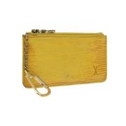 Pre-owned Leather pouches Louis Vuitton Vintage , Yellow , Dames