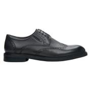 Zwarte leren brogues met decoratieve perforatie Estro , Black , Heren