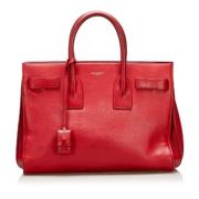 Pre-owned Leather handbags Yves Saint Laurent Vintage , Red , Dames