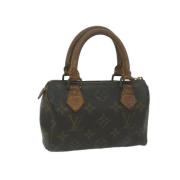 Pre-owned Canvas handbags Louis Vuitton Vintage , Brown , Dames