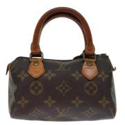 Pre-owned Canvas handbags Louis Vuitton Vintage , Brown , Dames