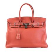 Pre-owned Leather handbags Hermès Vintage , Red , Dames