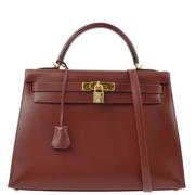 Pre-owned Leather handbags Hermès Vintage , Red , Dames