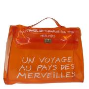 Pre-owned Vinyl handbags Hermès Vintage , Orange , Dames