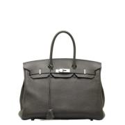 Pre-owned Leather handbags Hermès Vintage , Black , Dames