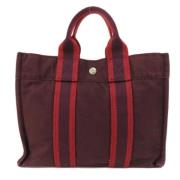 Pre-owned Canvas handbags Hermès Vintage , Red , Dames