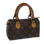 Pre-owned Canvas handbags Louis Vuitton Vintage , Brown , Dames