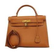 Pre-owned Leather handbags Hermès Vintage , Brown , Dames