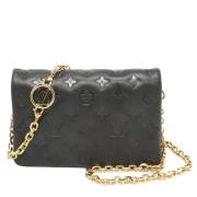 Pre-owned Leather clutches Louis Vuitton Vintage , Black , Dames