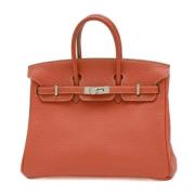 Pre-owned Leather handbags Hermès Vintage , Orange , Dames