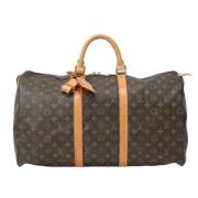 Pre-owned Canvas handbags Louis Vuitton Vintage , Brown , Dames