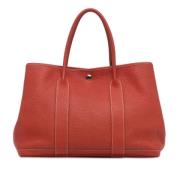 Pre-owned Leather handbags Hermès Vintage , Orange , Dames