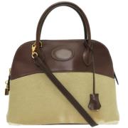 Pre-owned Fabric handbags Hermès Vintage , Beige , Dames