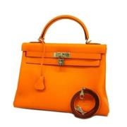 Pre-owned Fabric handbags Hermès Vintage , Orange , Dames