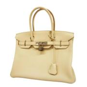 Pre-owned Fabric handbags Hermès Vintage , Beige , Dames