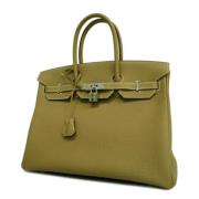 Pre-owned Fabric handbags Hermès Vintage , Green , Dames