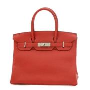 Pre-owned Fabric handbags Hermès Vintage , Red , Dames