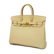 Pre-owned Fabric handbags Hermès Vintage , Yellow , Dames