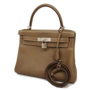 Pre-owned Fabric handbags Hermès Vintage , Brown , Dames