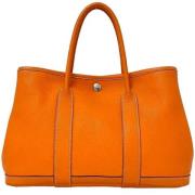 Pre-owned Fabric handbags Hermès Vintage , Orange , Dames