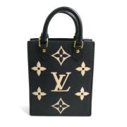 Pre-owned Canvas handbags Louis Vuitton Vintage , Black , Dames