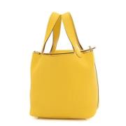 Pre-owned Fabric handbags Hermès Vintage , Yellow , Dames