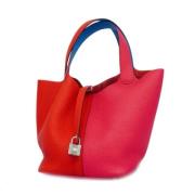 Pre-owned Fabric handbags Hermès Vintage , Red , Dames