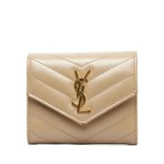 Pre-owned Leather wallets Yves Saint Laurent Vintage , Beige , Dames