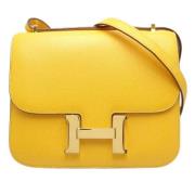Pre-owned Fabric crossbody-bags Hermès Vintage , Yellow , Dames