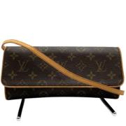 Pre-owned Canvas clutches Louis Vuitton Vintage , Brown , Dames